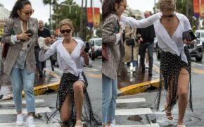 Tình cũ của Leonardo DiCaprio trượt chân ngã trong trời mưa