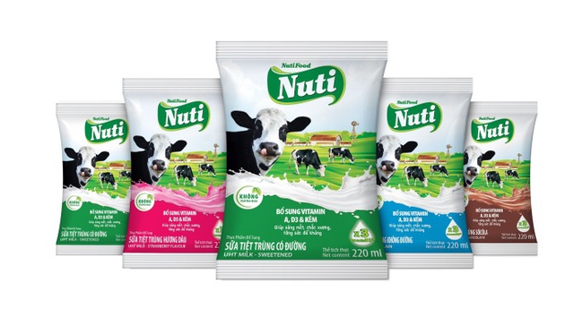 Uống sữa Nuti rước thần may mắn về nhà cho năm mới - 2 Uống sữa Nuti rước thần may mắn về nhà cho năm mới - 2