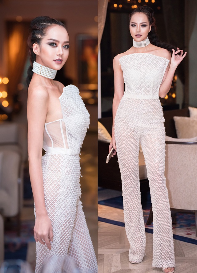 Người đẹp Kiều Ngân nổi bật trong bộ jumpsuit thiết kế vô cùng độc đáo và đẹp mắt với chất liệu lưới xuyên thấu cũng giúp cho người mặc thêm phần gợi cảm và quyến rũ. Kiều Ngân khéo léo khi kết hợp tông trang điểm mắt khói, môi thâm cùng với mái tóc tết Boho được tạo kiểu một cách tỉ mỉ và cầu kỳ để tạo nên một tổng thể hoàn hảo.