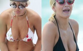 Ca sỹ người Anh tưng bừng đùa giỡn với sóng nước