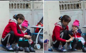 Ảnh hai mẹ con đánh giầy trên phố giáp Tết thu hút hàng ngàn lượt cảm xúc