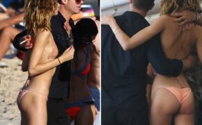 Ca sỹ điển trai người Mỹ ôm chặt bạn gái gợi cảm