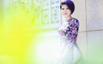 Búp bê Thanh Thảo “liều mình” mặc áo dài