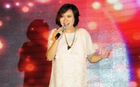 Khánh Linh khệ nệ bụng bầu đi dự tiệc