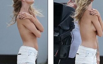 Siêu mẫu Anh cởi áo để chụp hình quảng cáo