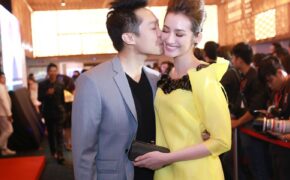Trúc Diễm và chồng tình tứ hôn nhau trên thảm đỏ