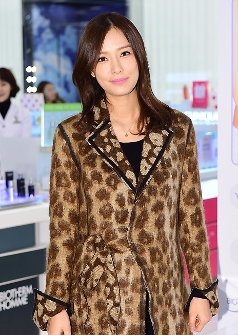 Son Tae Young mang bầu to vẫn xuất hiện tại một sự kiện ở Seoul, Hàn Quốc, tháng 12/2014.